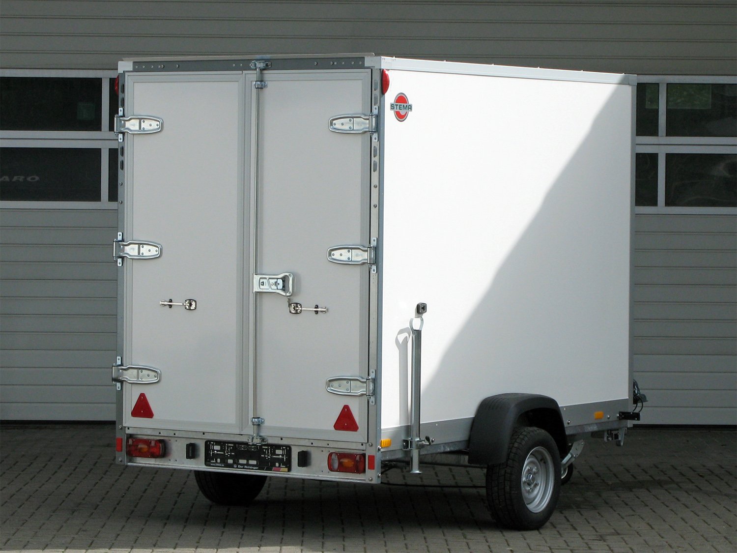 STEMA STPK O2 15-25-15.1.P18.2 Flügeltüren - Kofferanhänger 1500 kg STEMA STPK O2 15-25-15.1.P18.2 Flügeltüren - Kofferanhänger 1500 kg – Bild 1